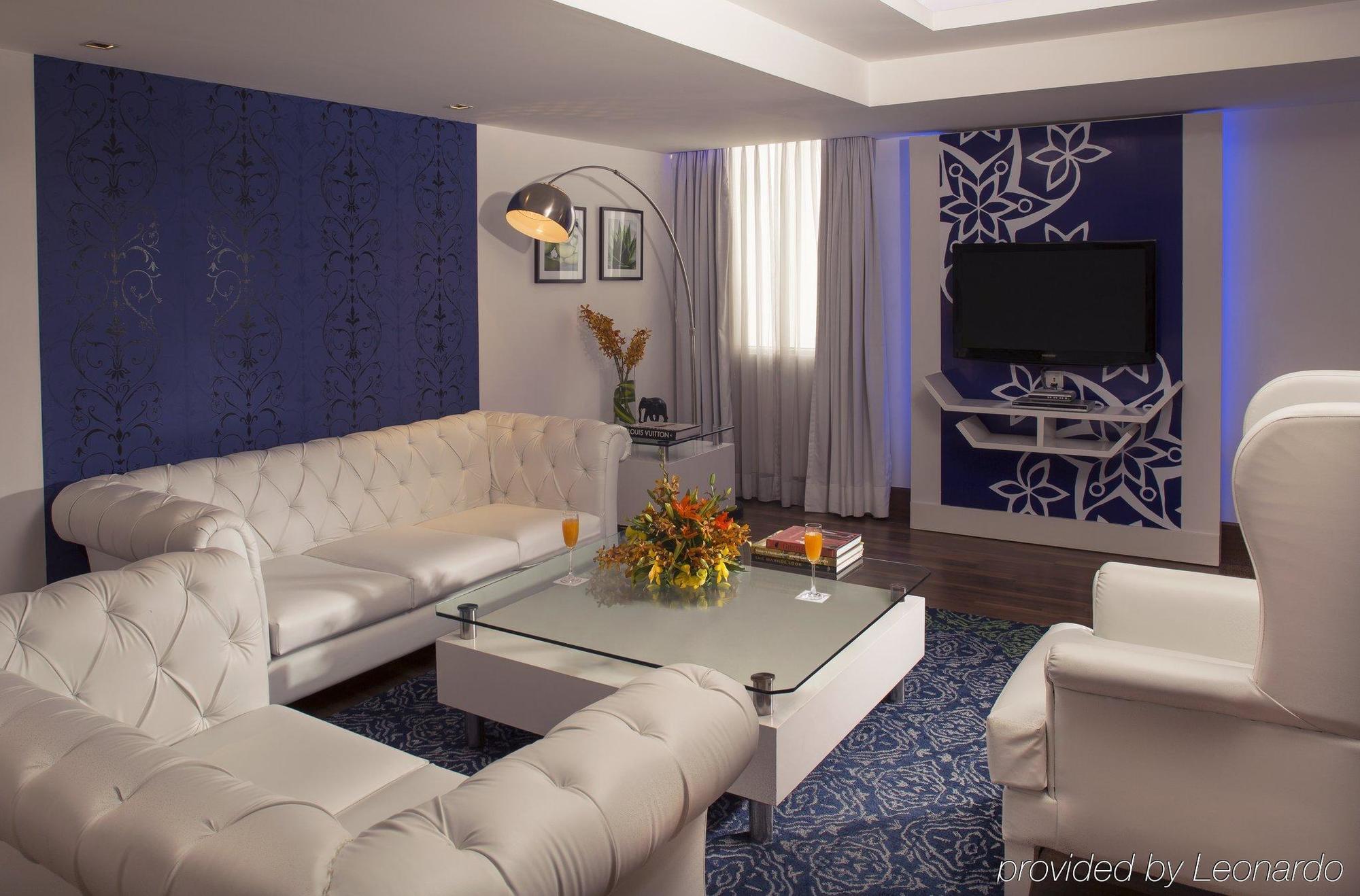 Radisson Blu Kochi Hotel Buitenkant foto A 3D rendering of a living room